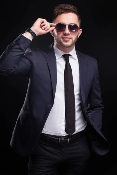 Young confident businessman in sunglasses — Stock Photo, Image