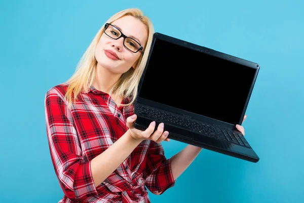 Studio Portrait Beautiful Young Woman Holding Modern Laptop Blue Background — Stock Photo, Image