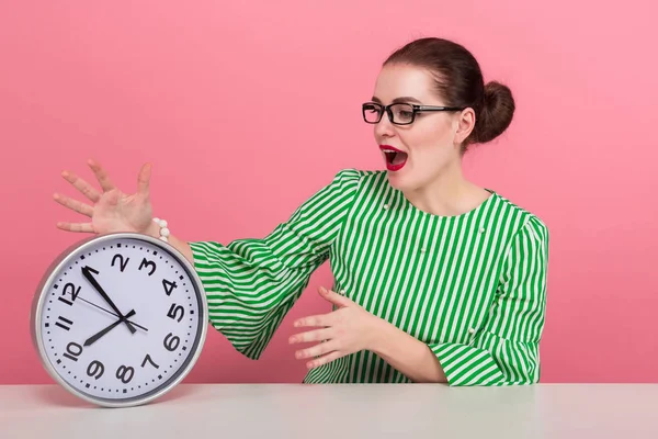 Attractive Young Brunette Woman Eyeglasses Wall Clock Sitting Table — Stock Photo, Image