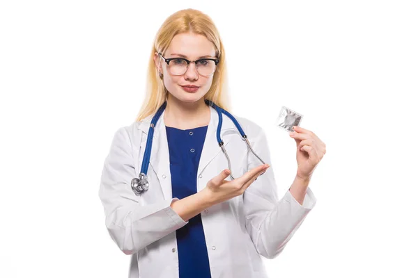 Young Female Doctor Holding Condom Isolated White Background — Stockfoto