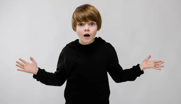 Cute Caucasian Boy Black Outfit Showing Different Expressions White Wall — Stock Photo, Image