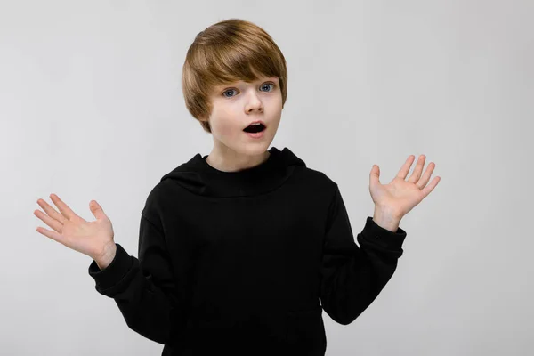 Cute Caucasian Boy Black Outfit Showing Different Expressions White Wall — Stock Photo, Image