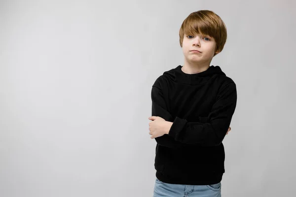 Cute Caucasian Boy Black Outfit Showing Different Expressions White Wall — Stock Photo, Image