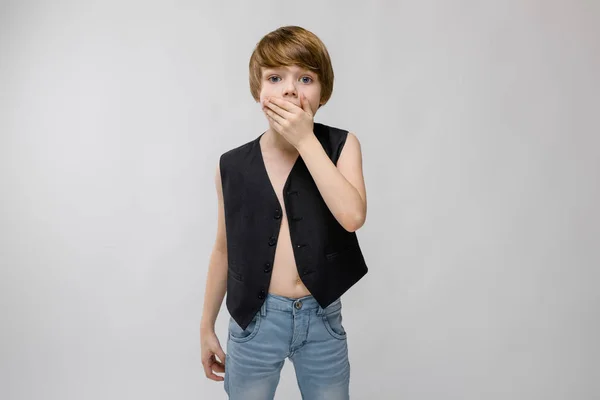 Cute Caucasian Boy Black Waistcoat Showing Different Expressions White Wall — Stock Photo, Image