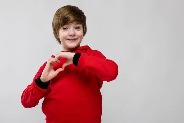 Niño Caucásico Preadolescente Agradable Traje Casual Que Muestra Diferentes Expresiones —  Fotos de Stock