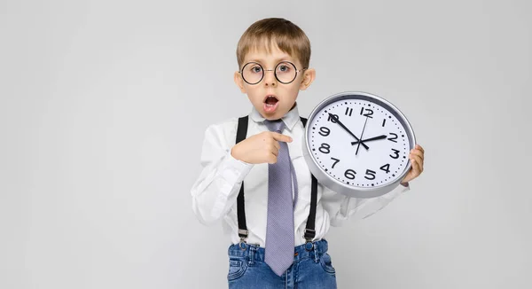 Portrait Adorable Serious Confident Little Boy Glasses Holding Clock Grey — Stock Photo, Image