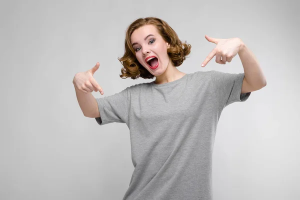 Portrait Beautiful Redhead Happy Young Woman Pointing Gray Background — Stock Photo, Image