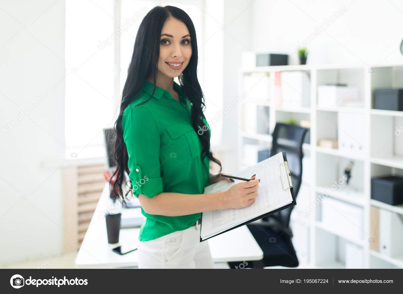 green blouse and white pants