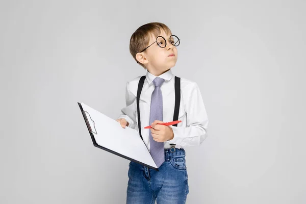 Charming Boy Holds Pen Sheets Notes — Stock Photo, Image