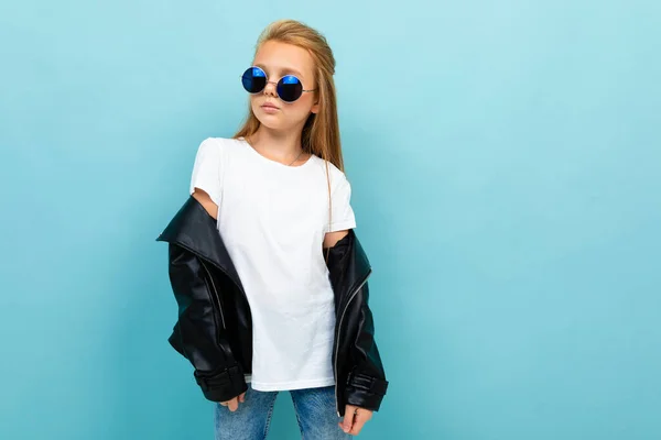 Little Cool Girl Black Leather Jacket Sunglasses Posing Blue Background — Stockfoto