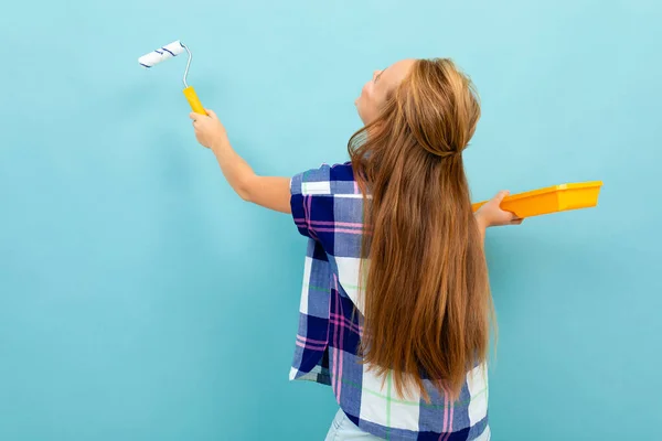 Little Girl Posing Paint Roller Trough Blue Background — Stock Photo, Image
