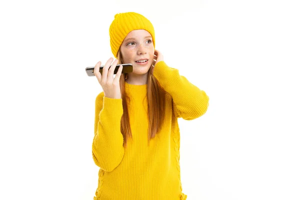 Cute Girl Wearing Yellow Clothes Posing Phone White Background — Stock Photo, Image