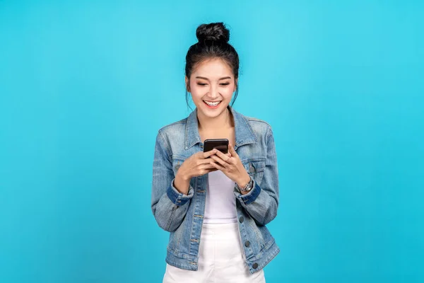 Portrait Happy Asian Woman Feeling Happiness Standing Typing Smartphone Blue Stok Gambar