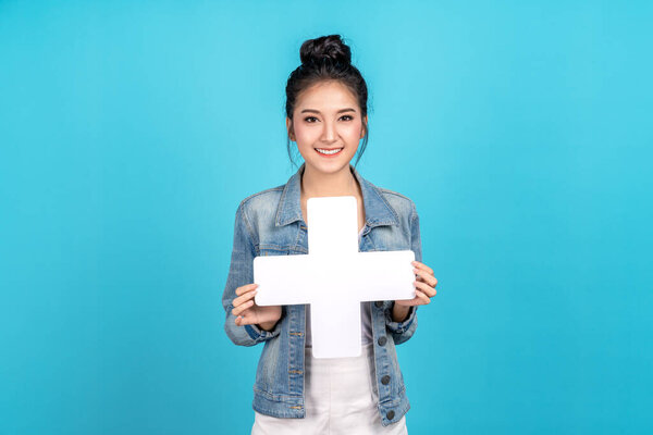 Happy Asian Woman Standing Holding Add Sign Blue Background Cute Stock Picture