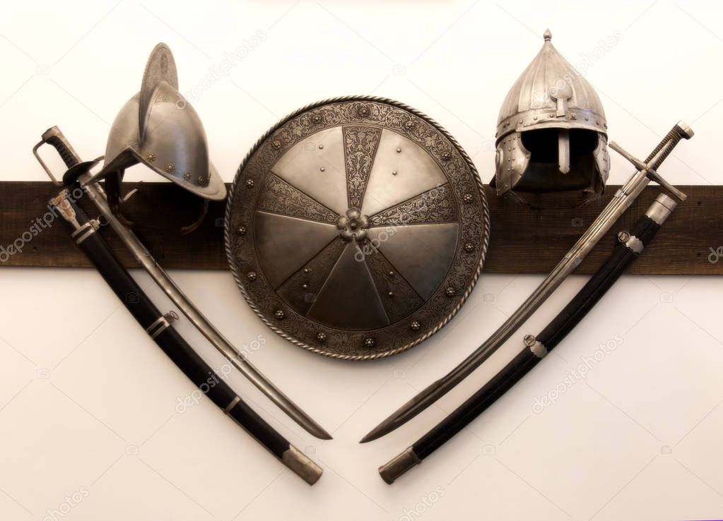 Knight helmets swords shield