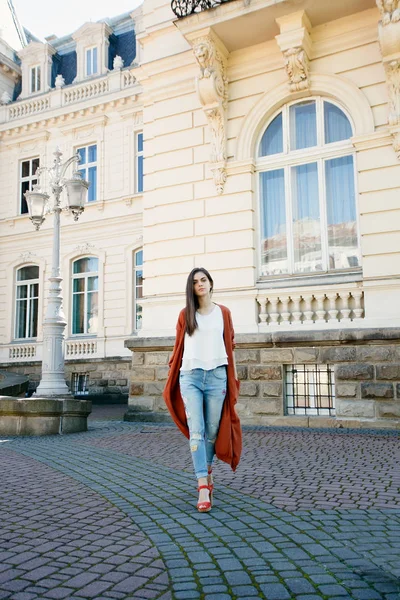 Young beautiful stylish woman walking