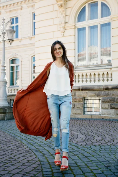 Young beautiful stylish woman walking