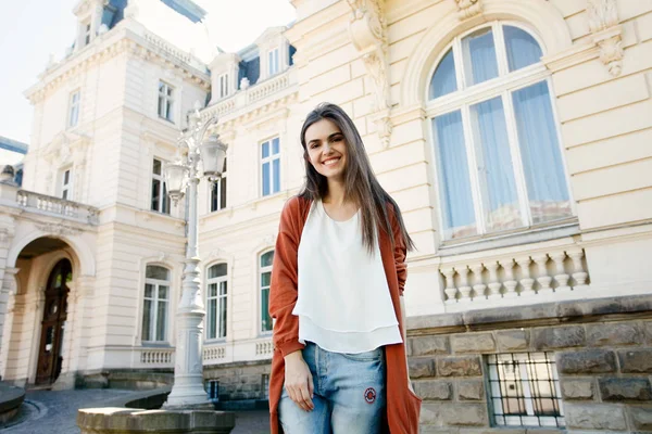 Young beautiful stylish woman walking