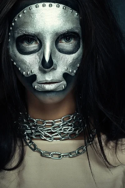 Beautiful girl model with black body with silver mask — Stock Photo, Image