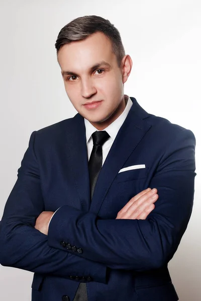 Portrait of handsome man in black blue suit — Stock Photo, Image