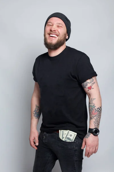 Young man throws money to camera. — Stock Photo, Image