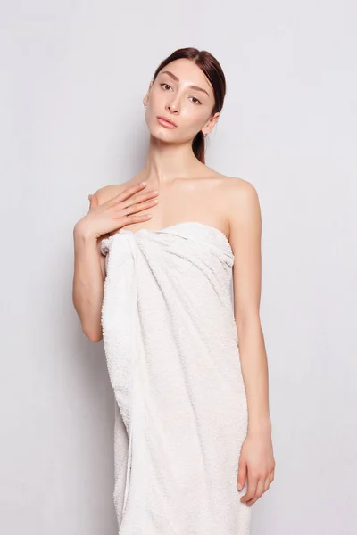 Beautiful woman in white bathrobe after spa — Stock Photo, Image