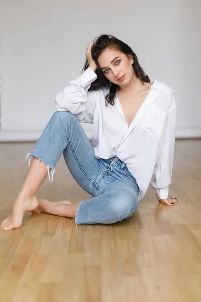 Portrait Seated Young Woman Wearing Bouffant Shirt Naked Shoulders Light — Stock Photo, Image