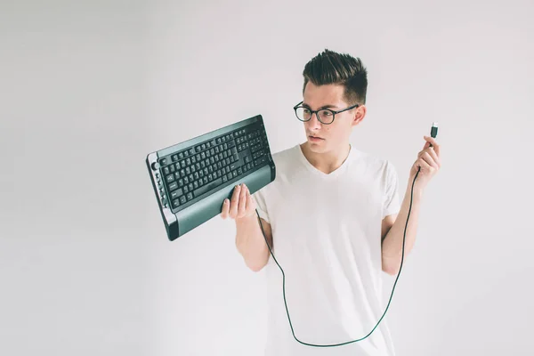 Funny computer geek isolated on white. Nerd is wearing glasses. — Stock Photo, Image