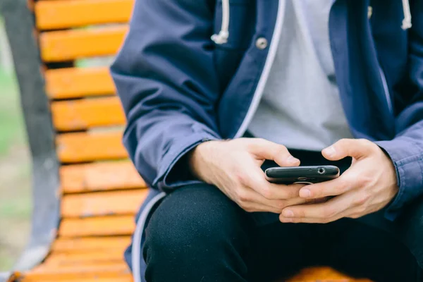 Handsome man cell phone outdoor city street, Young attractive student casual blue shirt talking — Stock Photo, Image