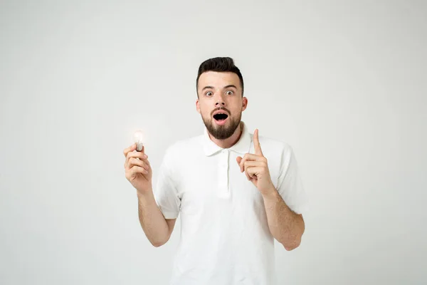 Young cool bearded man idea concept, happy student coming up with an or solution. isolated on white — Stock Photo, Image
