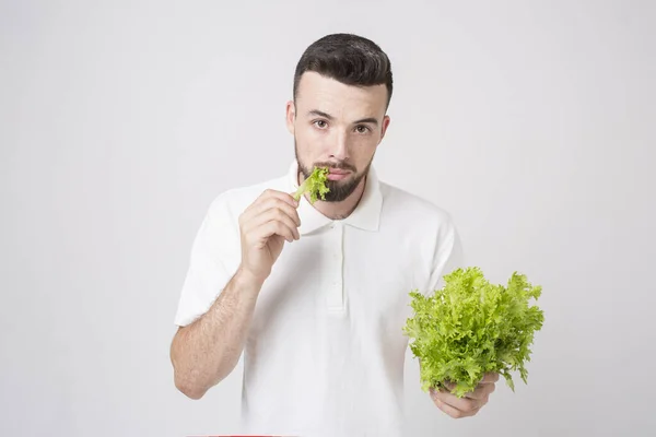 Muž držící saláty zblízka. koncepce. Superfoods — Stock fotografie