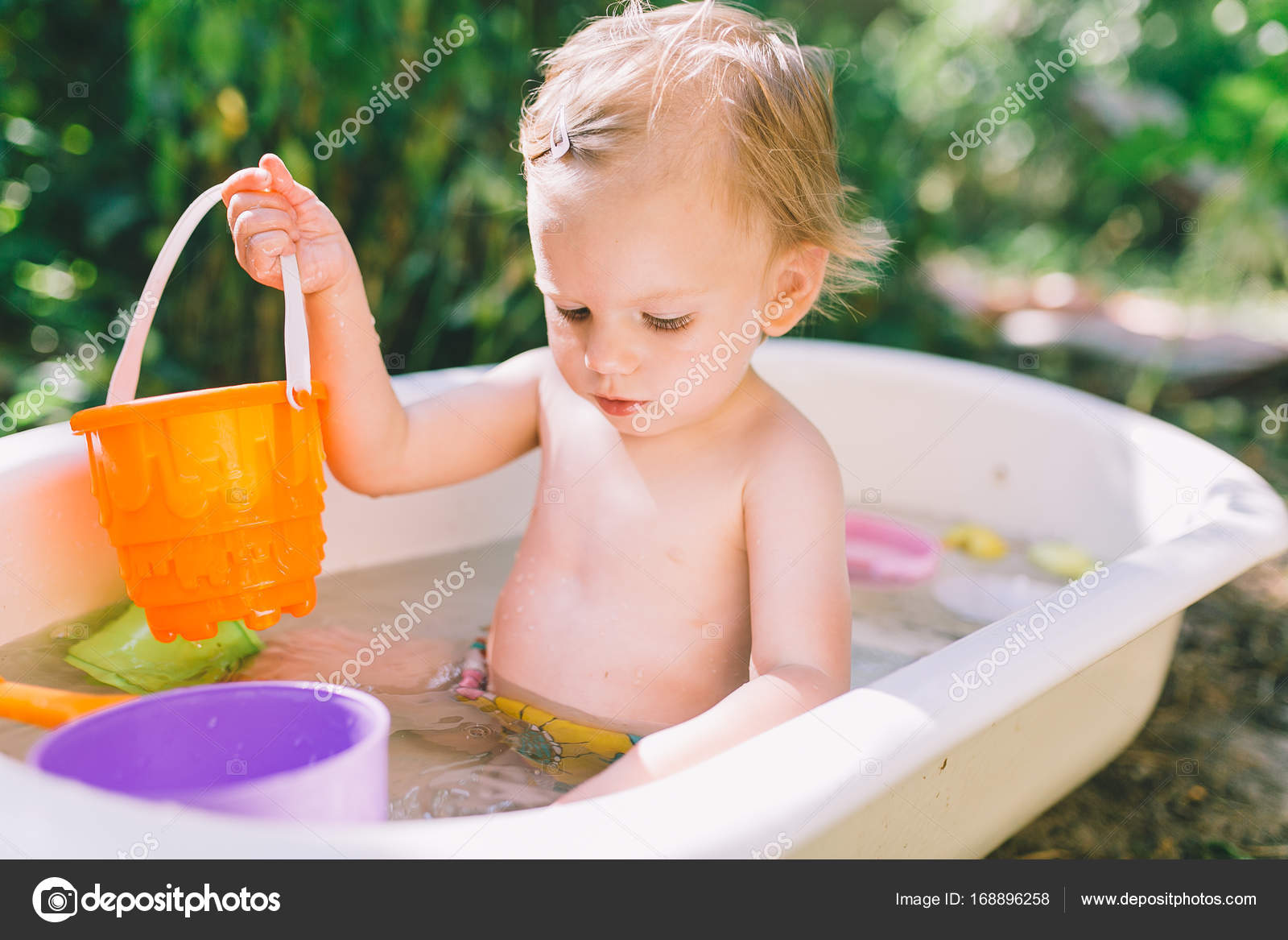 little girl bathing