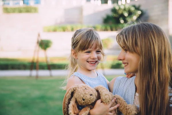 Young mother and happy daughter — Stock Photo, Image