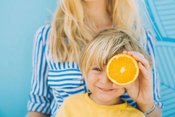 Woman Covering Eyes Toddler Cute Boy Orange — Stock Photo, Image