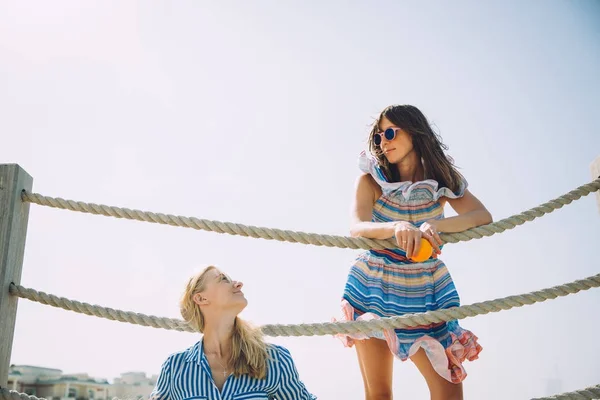 Two Beautiful Female Friends Relaxing Pier Sunny Day — Stock Photo, Image