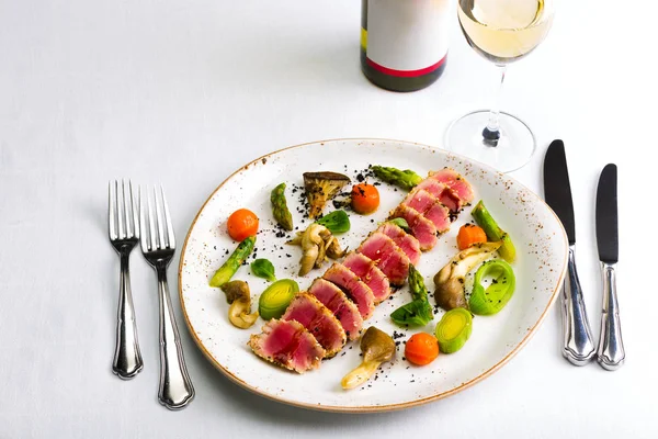 Seafood salad with tuna on white tablecloth background — Stock Photo, Image