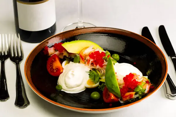 Seafood salad with red caviar and vegetables — Stock Photo, Image