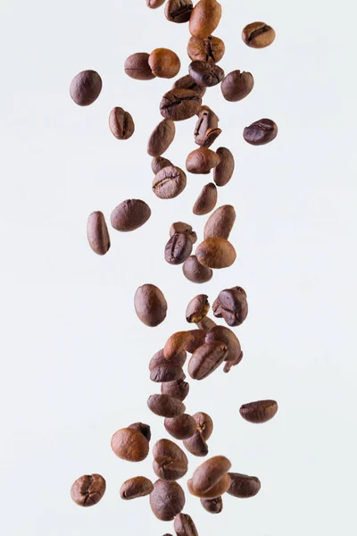 Grains Roasted Coffee Falling White Background Studio Light — Stock Photo, Image
