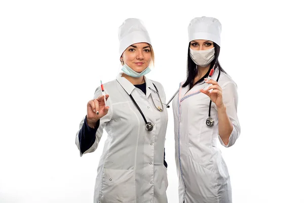 Preparation for giving an injection by the young health workers — Stock Photo, Image