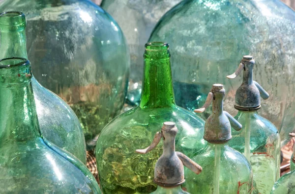 green glass containers typical of the island of Mallorca, Spain
