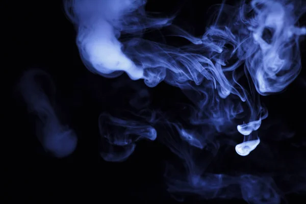 Smoke slaves on a black background — Stock Photo, Image