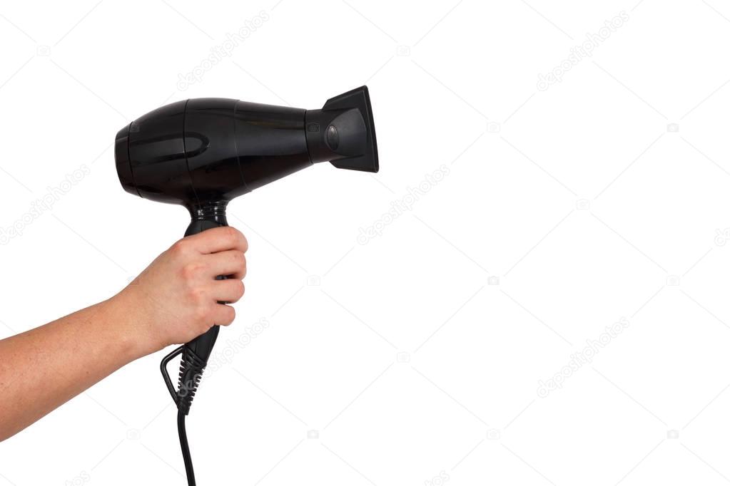 Black hair dryer in woman's hands
