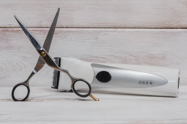 Hairdressing scissors and clipper