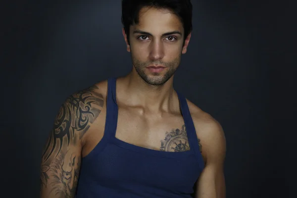 Handsome male wearing a top tank — Stock Photo, Image