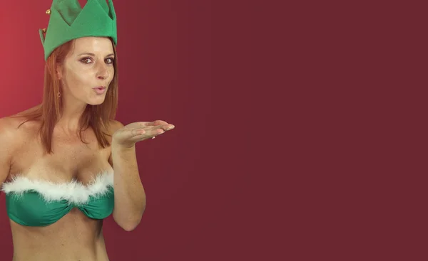 Sexy Elfe bläst auf ihre Hand — Stockfoto