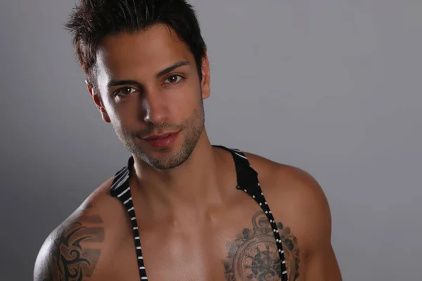 Gorgeous tattooed male model — Stock Photo, Image