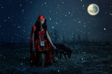Beautiful little Red Riding Hood in the forest clipart