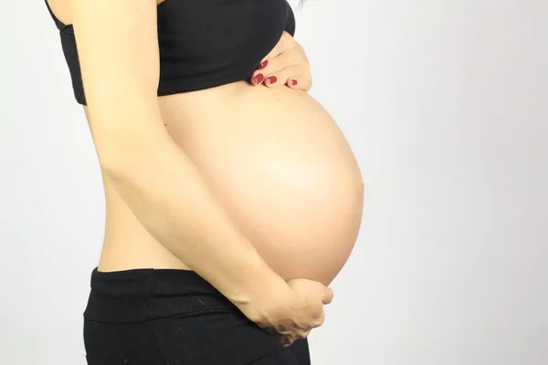 Filmagem Estúdio Perto Mulher Grávida Tocando Sua Barriga Isolado Fundo — Fotografia de Stock