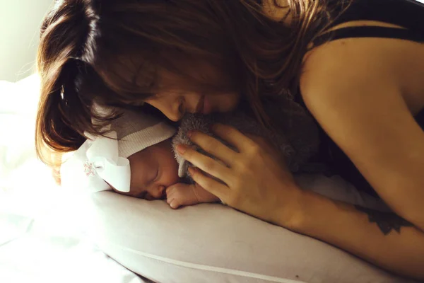 Proud Mother Holding Her Newborn Baby Bed — Stock Photo, Image