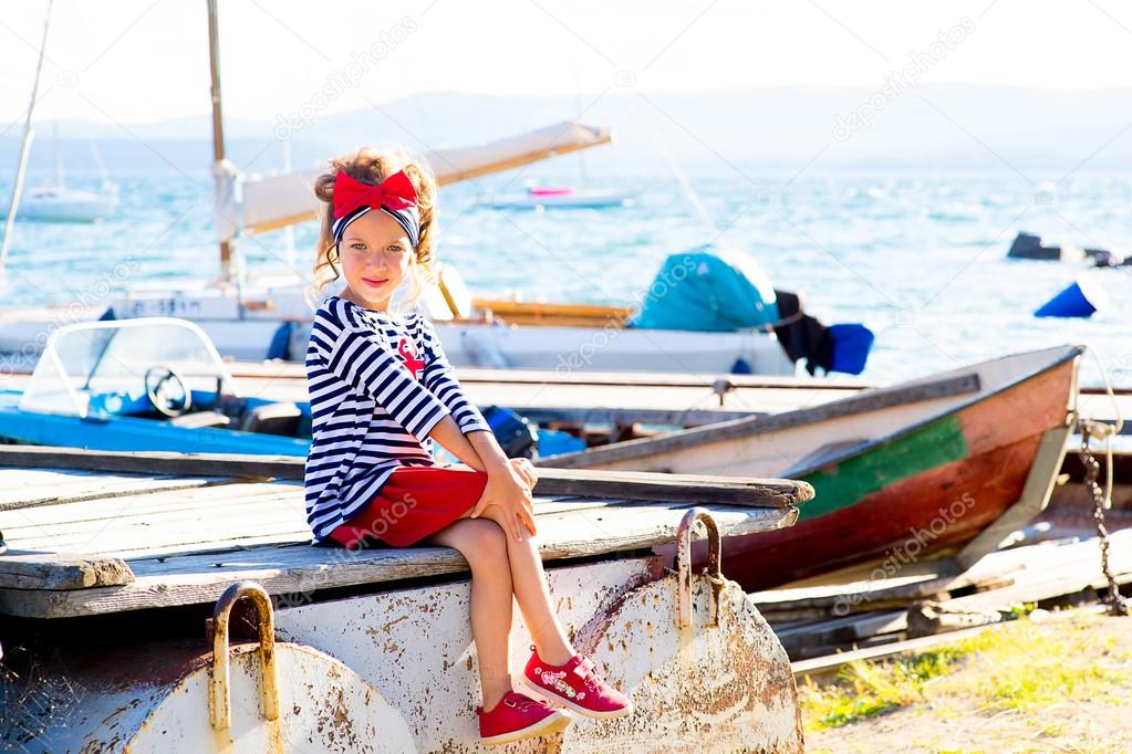 young girl with the boat